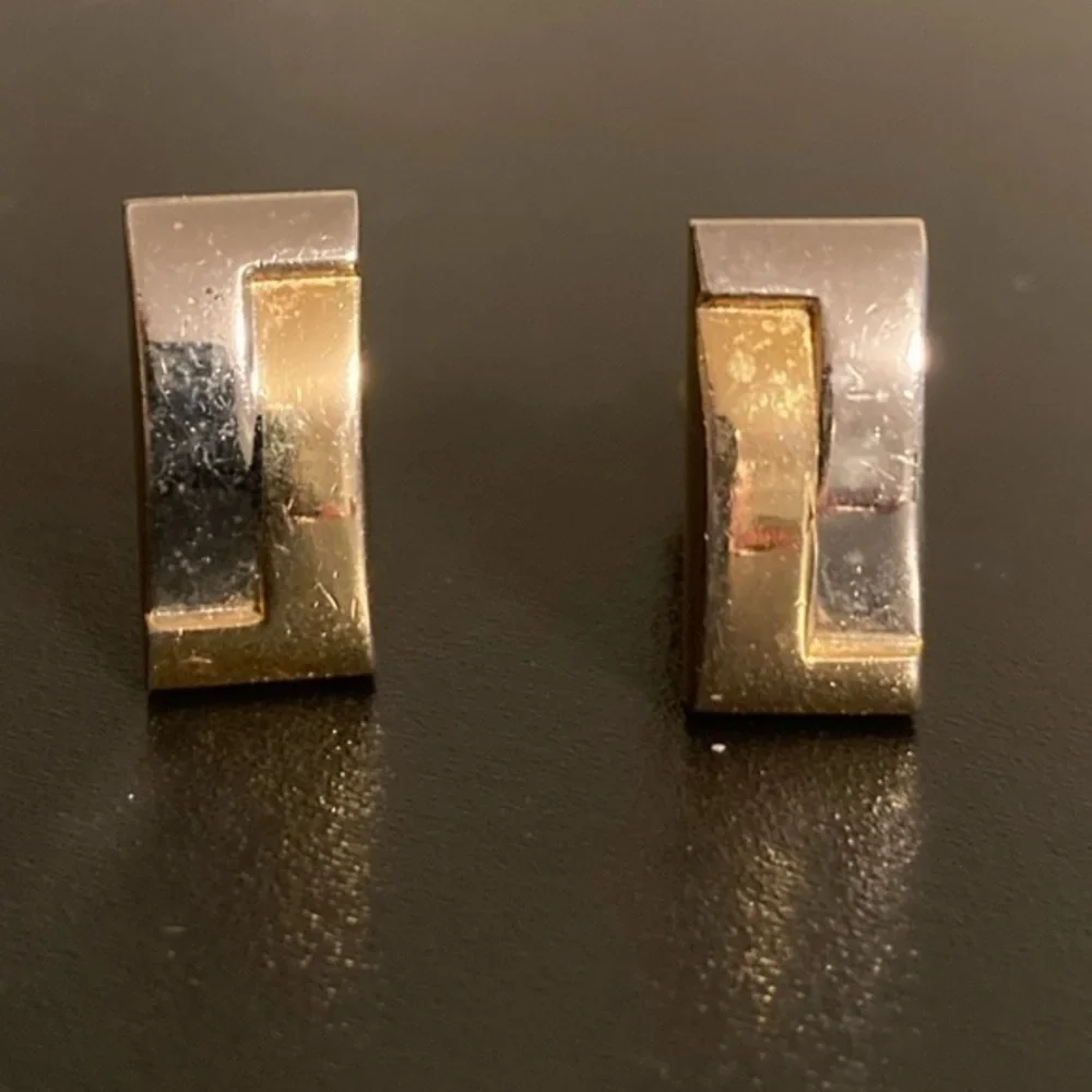 Golden and silver tone cuff links